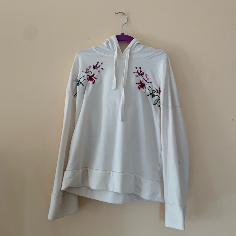 White top with embroidered flowers